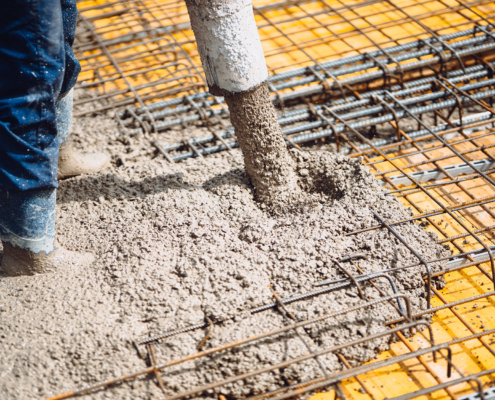 Worker Pouring Concrete